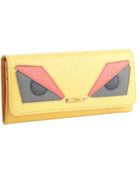 Fendi Yellow Saffiano Leather Eye Continental Wallet - Lyst