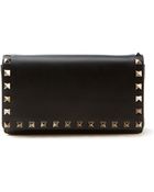 Valentino Black Studded Leather Flap Clutch - Lyst