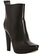 Calvin Klein Black Leather Giselle Platform Booties - Lyst
