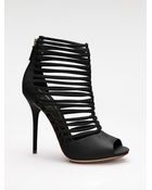 Gucci Inga Strappy Leather Ankle Boots - Lyst