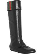 Gucci Black Leather Sly Web Cuffed Flat Boots - Lyst
