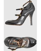 Dolce & Gabbana Pumps with Open Toe - Lyst
