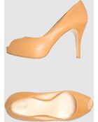 Roberto Festa Pumps with Open Toe - Lyst