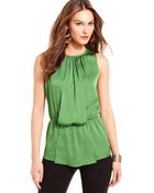 Vince Camuto Sleeveless Draped Peplum Hem Top - Lyst