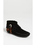 Minnetonka Concho Feather Moccasin - Lyst