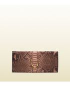 Gucci Soft Stirrup Pink Tan Python Clutch - Lyst