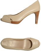 Stuart Weitzman Pumps with Open Toe - Lyst