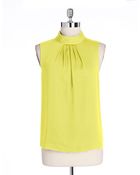 Anne Klein Sleeveless Pleated Blouse - Lyst