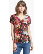 Bellatrix Cutout Shoulder Print Top - Lyst