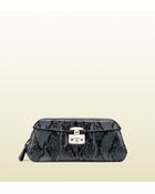 Gucci Lady Lock Python Clutch - Lyst
