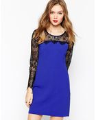 Aryn K. Body-Conscious Dress With Contrast Lace Sleeves - Lyst