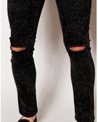 Asos Super Skinny Jeans In Washed Black With Rip - Lyst