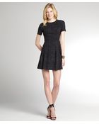 Nicole Miller Black Printed Stretch Pleated Dress - Lyst