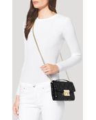 MICHAEL Michael Kors Crossbody - Sloan Small Patent Embossed Quilted Messenger - Lyst