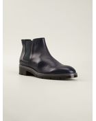 Tod's Round Toe Boots - Lyst