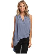 BCBGMAXAZRIA Cecil Asymmetrical Hem Blouse - Lyst