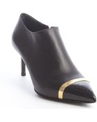 Saint Laurent Black Leather Gold Strap Pointed Toe Booties - Lyst