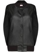 Pixie Market Black Varsity Leather Cape - Lyst