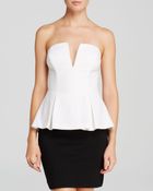 Guess Top - Strapless Plunge Peplum - Lyst