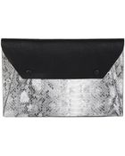 BCBGMAXAZRIA Sophie Embossed Colorblock Clutch - Lyst