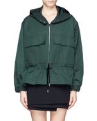 Stella McCartney Drawstring Peplum Parka Jacket - Lyst