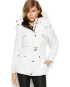 Jessica Simpson Hooded Faux-Fur-Collar Belted Puffer - Lyst