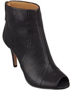 Nine West Lagunafun Peep Toe Booties - Lyst