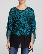 MICHAEL Michael Kors Animal Print Flutter Sleeve Top - Lyst