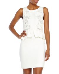 Sandro Embroidered Peplum Dress - Lyst