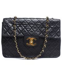 Chanel Pre-Owned Black Lambskin Maxi Single Flap Bag - Lyst