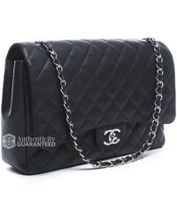 Chanel Pre-Owned Black Caviar Maxi Double Flap Bag - Lyst