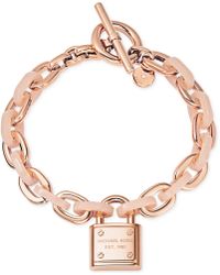 Michael Kors Rose Gold-Tone Padlock Logo Bracelet - Lyst