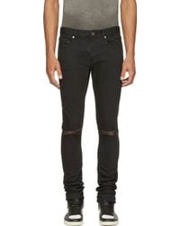 Saint Laurent Black Distressed Skinny Jeans - Lyst