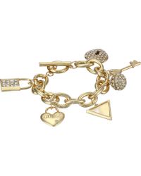 Guess Lock, Key, Hearts Charm Bracelet - Lyst