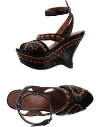 Alaïa Sandals - Lyst