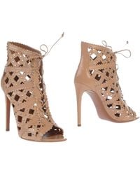 Alaïa Ankle Boots - Lyst