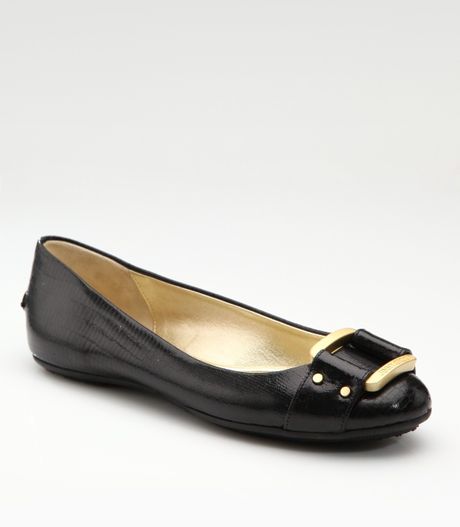 black flats with silver buckle