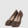 Prada Platform Pumps in Brown - Lyst