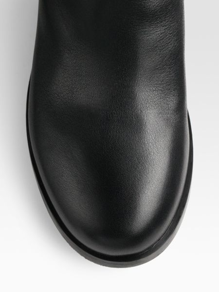 black leather knee high buckle boots