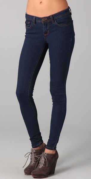 Nightcap Clothing Mid Rise Skinny Jeans - Lyst
