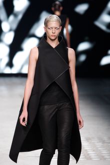 Gareth Pugh Spring 2012 Black Asymmetric Sleeveless Long Coat With Leather Trimms - Lyst