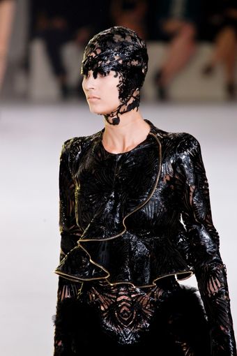 Alexander McQueen Spring 2012 Black Cut Out Shiny Leather Peplum Jacket with Gold Zip Trimmings - Lyst