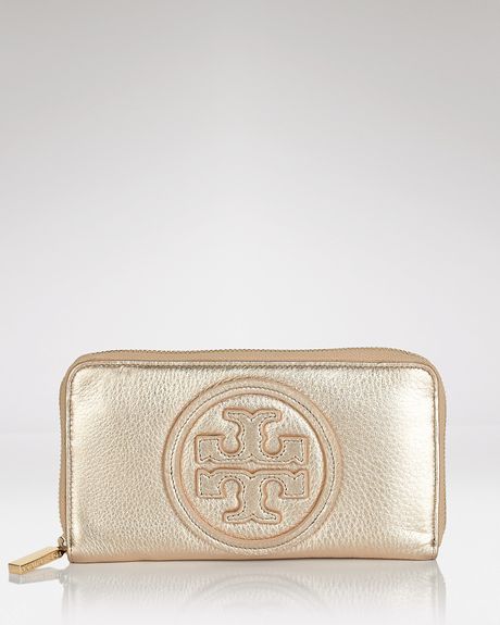 Tory Burch Logo Embossed Continental Wallet in Gold - Lyst