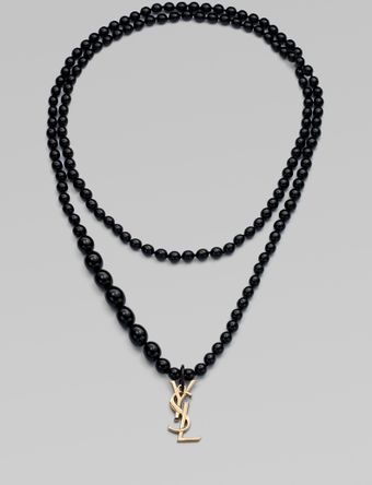 Yves Saint Laurent Resin Beaded Logo Pendant Necklace - Lyst