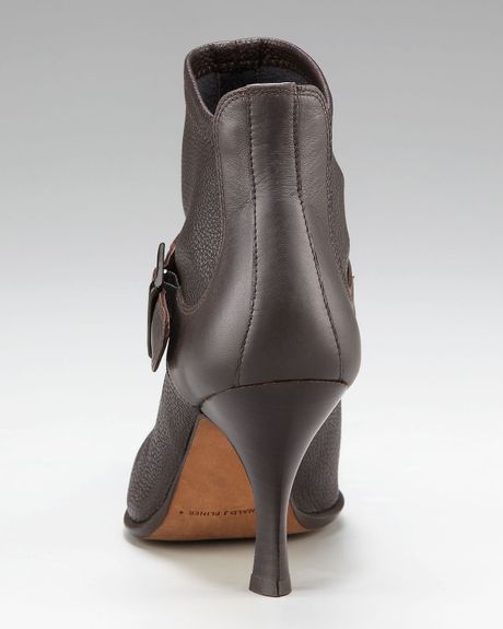 pointed toe buckle booties