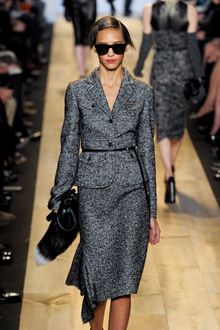Michael Kors Fall 2012 Black Leather Clutch with a Fox Tail  - Lyst