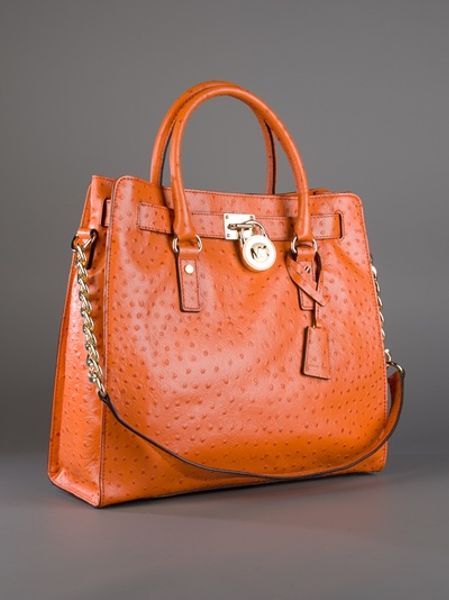 michael kors orange and white purse