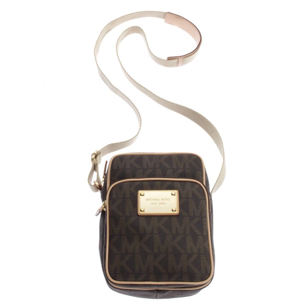 Michael Kors Mk Logo Flight Bag In Gold Lyst