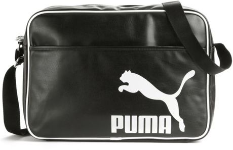 puma-black-heritage-reporter-messenger-bag-product-1-3290248-013548346_large_flex.jpeg