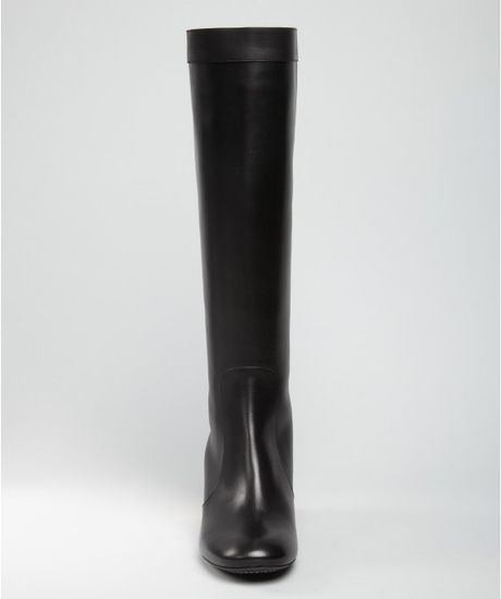 black boot with gold heel